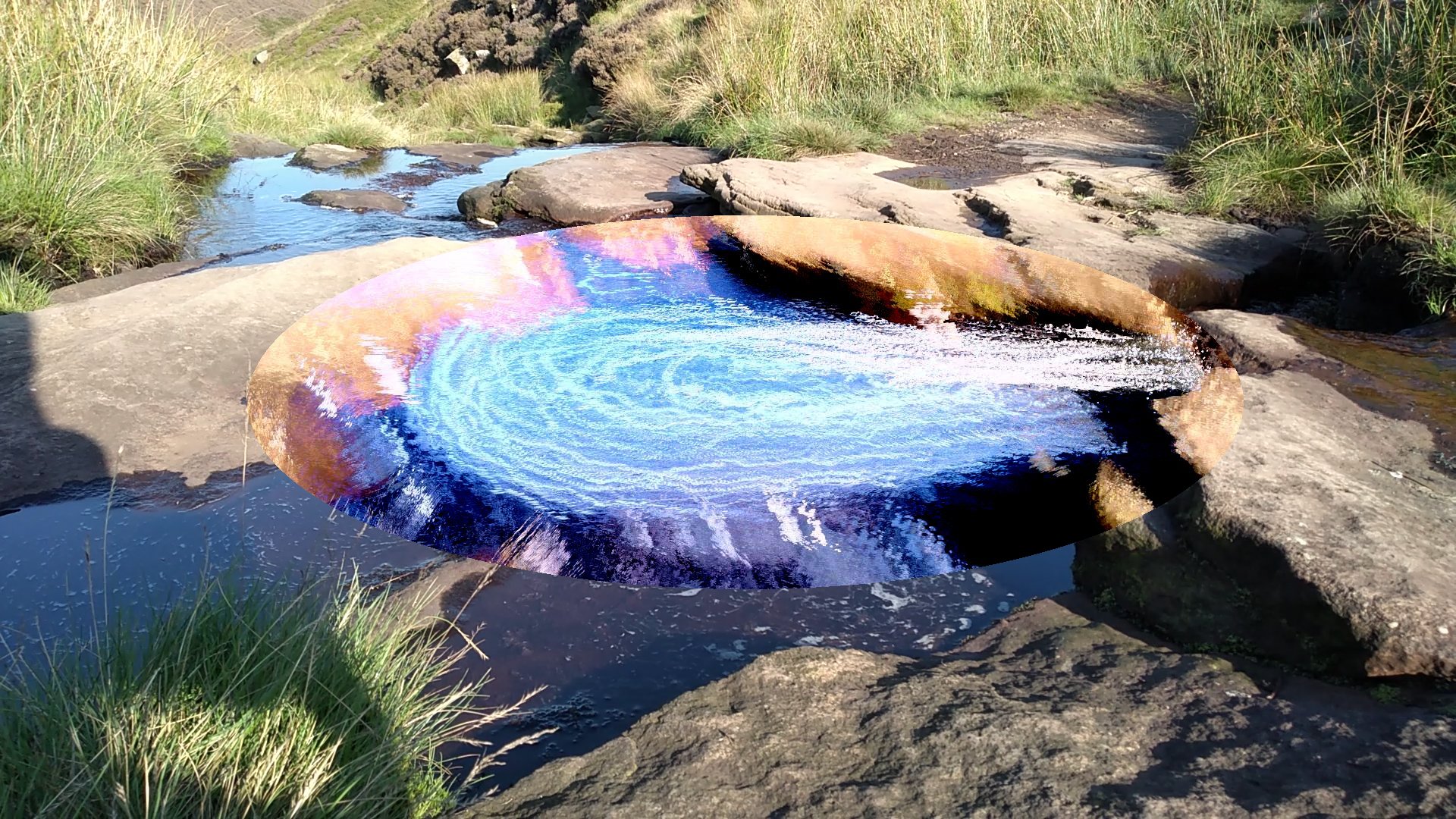 Generated from a video of a natural vortex taken on Wessenden Head Moor in the Peak District. The video frames were z-projected in Image-J with naturally-occurring foam acting as tracer particles, and then this image was contrasted, cropped to an ellipse, and superimposed on the first video frame.
